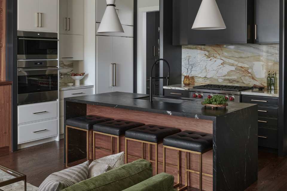 quiet luxury style open concept kitchen with marble backsplash